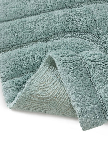 Tapis de bain 100% Coton tufté à la main DAN Bleu BENUTA